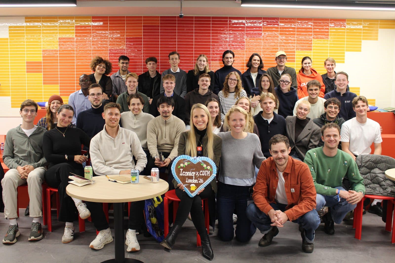 The CDTM class at Iconiq in London, with a gingerbread heart